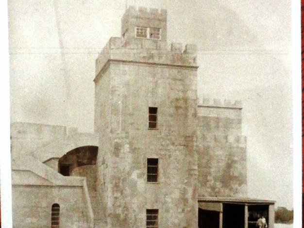 Fortaleza Ozama Black and white post card with the Ozama Fortress. You can see the USA Flag on top meaning the picture was taken between...