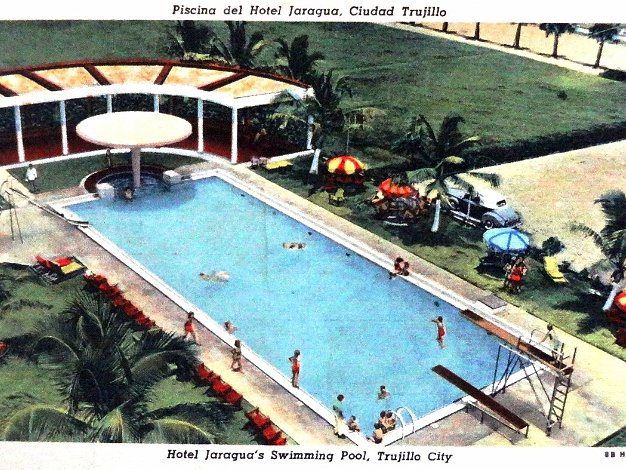 Hotel Jaragua Color post card with a view of the pool of the Jaragua Hotel in the main ocean front avenue of Ciudad Trujillo....
